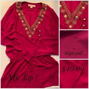Mk Top pink , long sleeve , slight pull ,